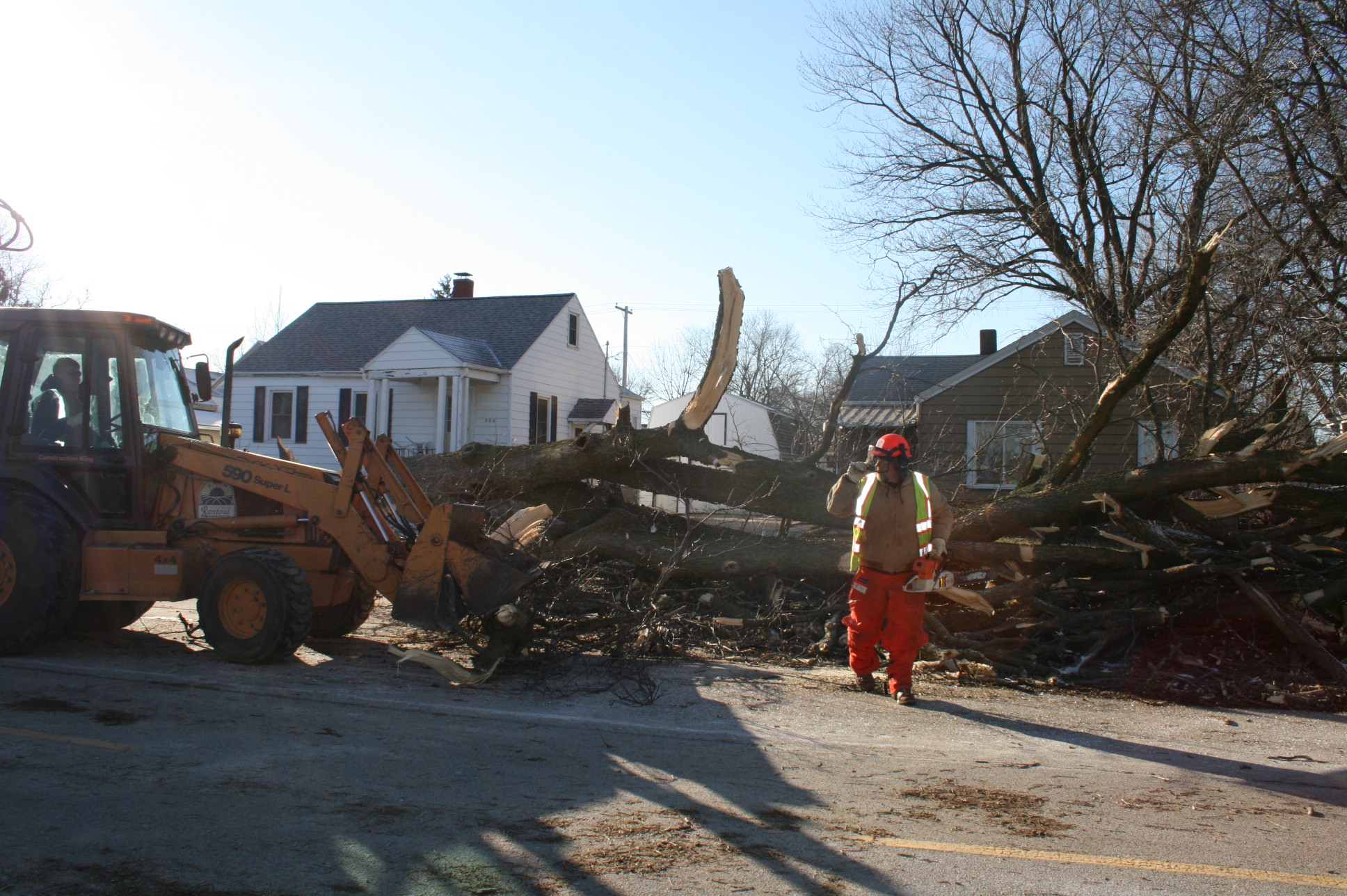 Crews Clean up large tree on S Chanute